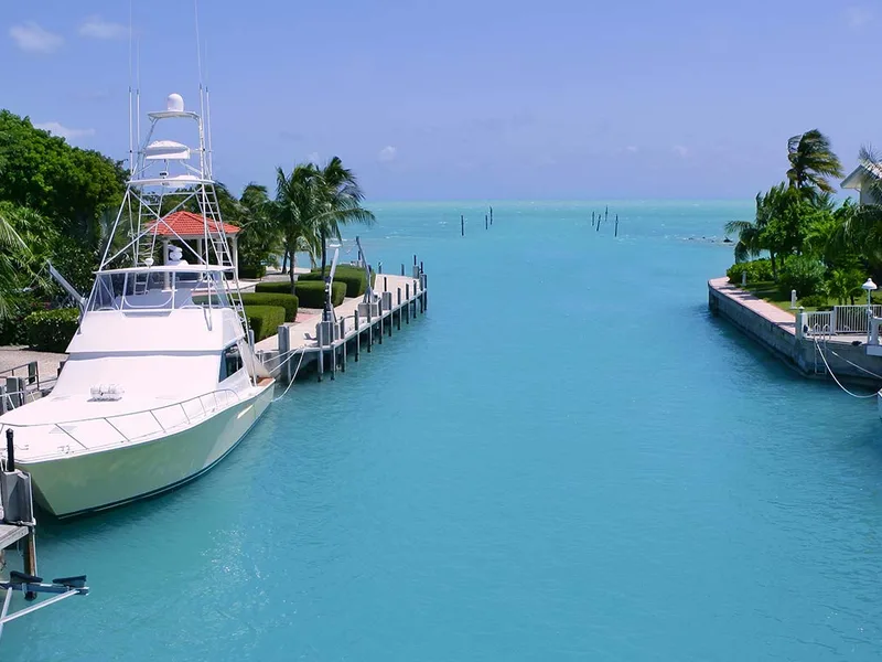 Yacht undergoing hull inspection at a marine repair facility in South Florida